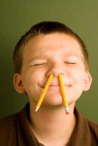 boy with pencils